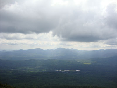 Looking south at Burnt Hill, Sugarloaf, and the Crockers from Bigelow Mountain's South Horn - Click to enlarge