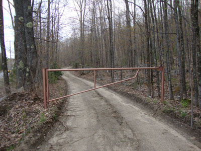 The gated logging road that ascends the east side of Bond Mountain