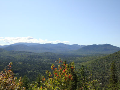 Looking south at the Brothers and southeast at Mt. Katahdin from the Burnt Mountain vista - Click to enlarge