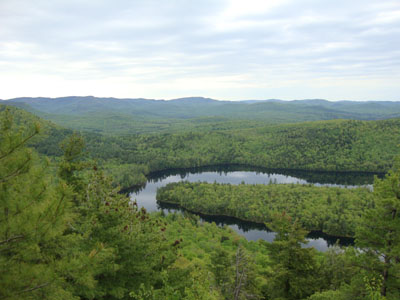 Looking over Horseshoe Lake toward the eastern White Mountains from near the summit of Lord Hill - Click to enlarge