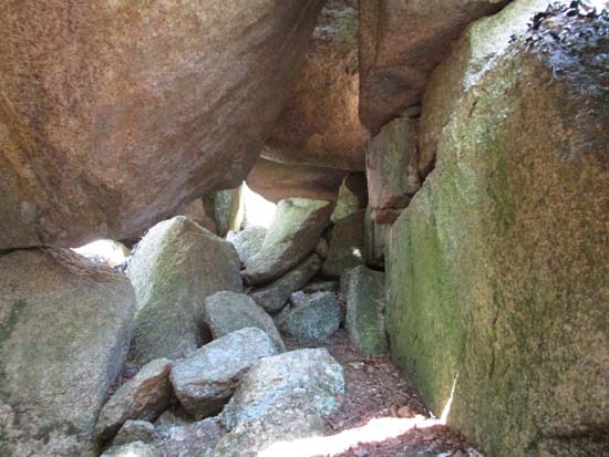 Descending through a cave on the way down Bald Knob