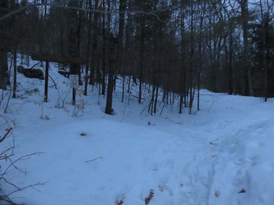 The start of the Bald Ledge Trail at the end of the maintained portion of Sky Pond Road