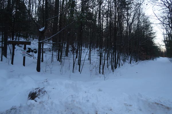 The start of the Bald Ledge Trail at the end of the maintained portion of Sky Pond Road