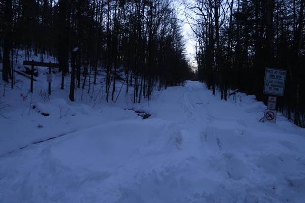 The start of the Bald Ledge Trail at the end of the maintained portion of Sky Pond Road