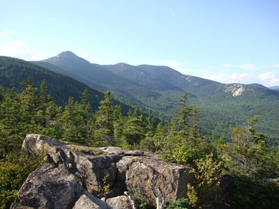 Looking at Mt. Chocorua, the Three Sisters, and Carter Ledge from the Bald Mountain ledges - Click to enlarge