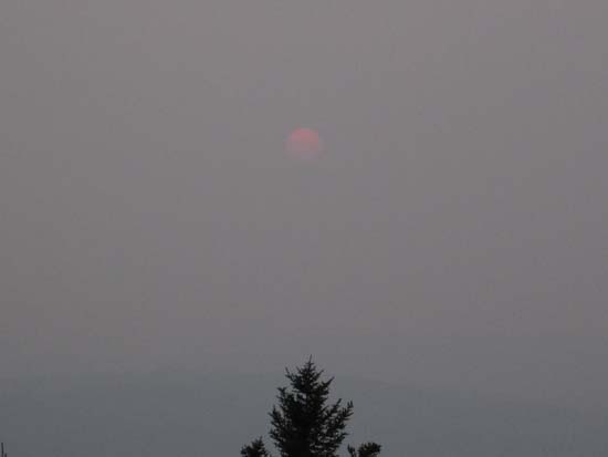 The smokey sunset as seen from the Belknap Mountain fire tower - Click to enlarge