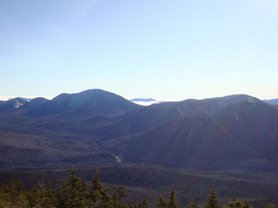 Looking at Mt. Carrigain, Mt. Chocorua, and the Hancocks from near the Bondcliff summit - Click to enlarge