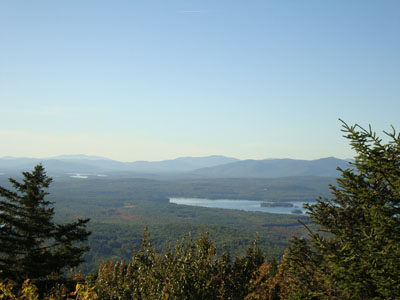 Looking at the Sandwich Dome and the Ossipees from the Copple Crown Mountain summit - Click to enlarge