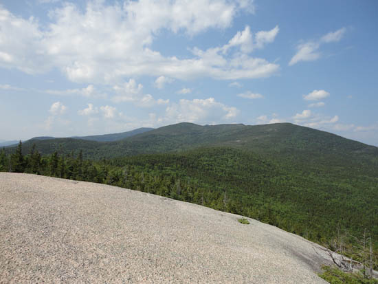 Looking at Green Mountain and Mt. Tecumseh from the Dickey Mountain northern ledges - Click to enlarge