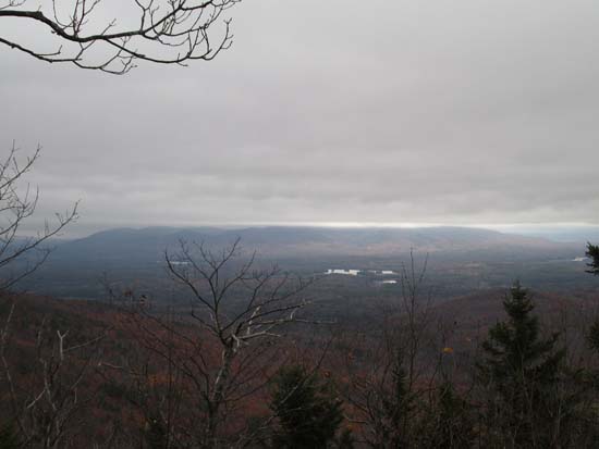 Looking at the Ossipees from near the summit of Dinsmore Mountain - Click to enlarge
