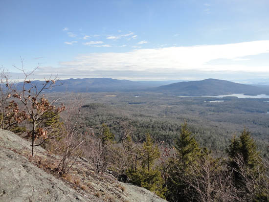 The Ossipees and Red Hill as seen from the ledges below East Doublehead along the Doublehead Trail - Click to enlarge