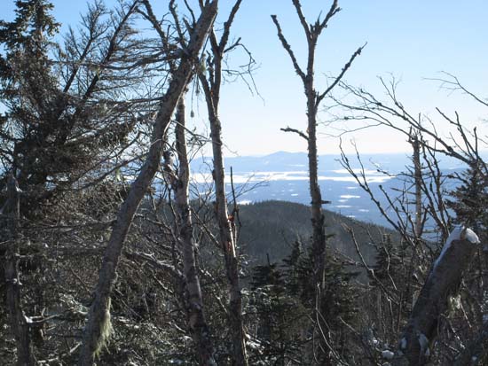 Slight views of the Belknaps from near the summit of East Sleeper - Click to enlarge