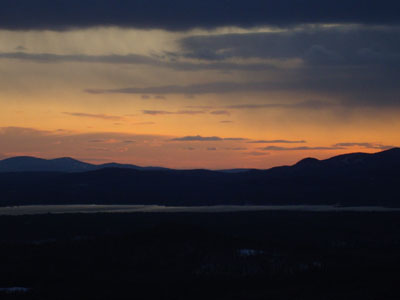 Sunset colors above Ossipee Lake and between the Belknaps and Ossipees as seen from the north peak of Foss Mountain - Click to enlarge