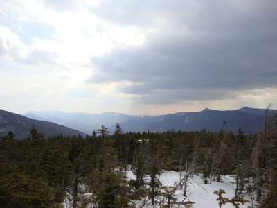 Looking at the Osceolas, Scar Ridge, Owl's Head, and Southern Franconias from Galehead - Click to enlarge