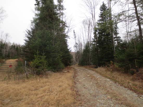 Starting a roadwalk (right) near a gate on a road beyond Brown Road