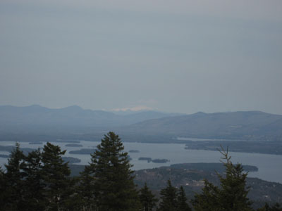 Looking at the Sandwich, Presidential, and Ossipee Ranges from Gunstock Mountain - Click to enlarge