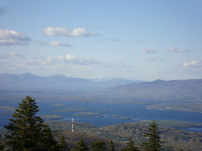 Looking at the snowcapped Presidentials, between the Sandwich Range and Ossipees, from Gunstock Mountain - Click to enlarge