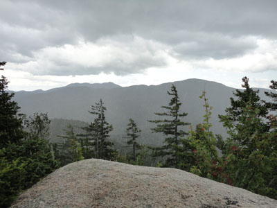 Looking at Mt. Chocorua and Mt. Paugus from Hedgehog Mountain as the downpour begins - Click to enlarge