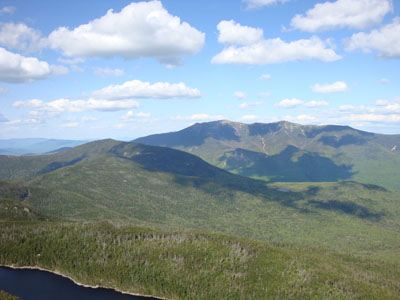 Cannon Mountain and the Franconia Ridge as seen from the ledge near the summit of Kinsman Mountain's North Peak - Click to enlarge