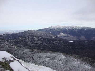 Cannon Mountain and the Franconia Ridge as seen from the ledge near the summit of Kinsman Mountain's North Peak - Click to enlarge