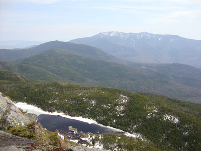 Looking at Kinsman Pond and the Franconia Ridge from the North Kinsman view ledge - Click to enlarge
