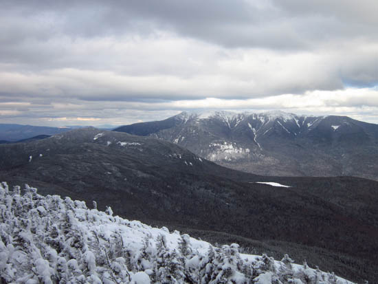 Looking at Kinsman Pond and the Franconia Ridge from the North Kinsman view ledge - Click to enlarge