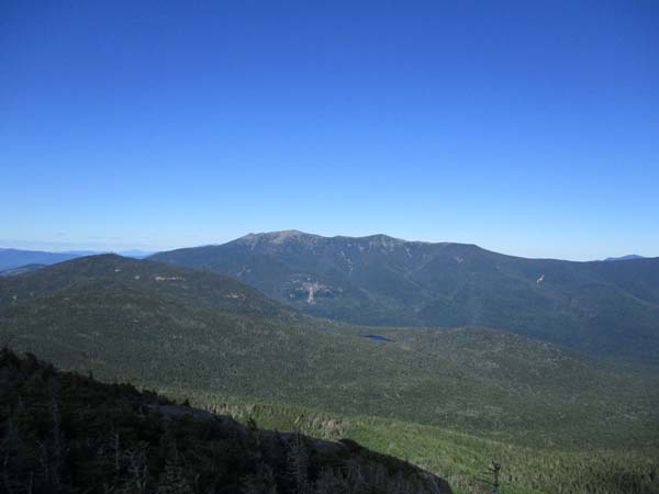 Cannon Mountain and the Franconia Ridge as seen from the North Kinsman vista - Click to enlarge
