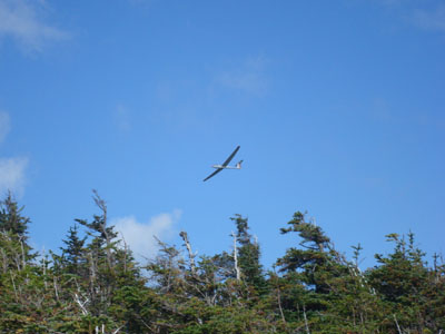 A glider flying over North Kinsman