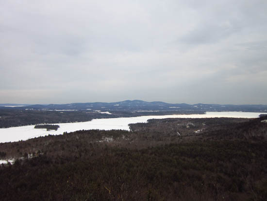 Looking east-southeast at the Belknaps from the Ladd Mountain ledge vista - Click to enlarge