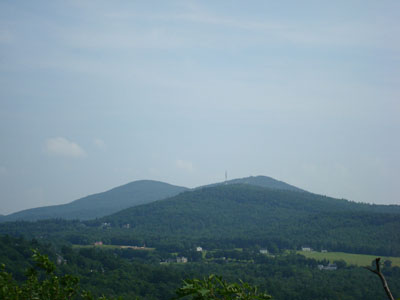 Looking south at Belknap Mountain, Mt. Rowe, and Gunstock Mountain from near the Locke's Hill summit - Click to enlarge