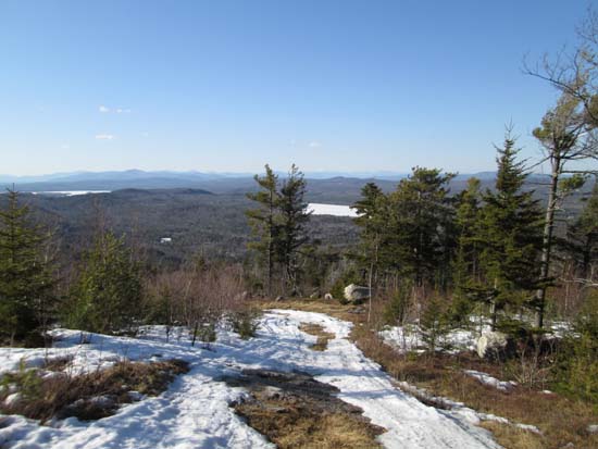 Looking down the snowmobile trail with the Presidentials in the distance center right