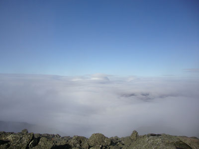 A mushroom cloud seen amongst the undercast from Mt. Adams - the Iranians nuked Randolph! - Click to enlarge