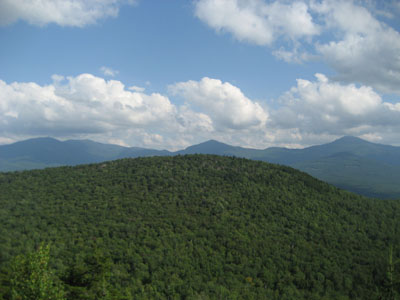 Looking south over Cleveland Mountain at the Twins, Garfield Ridge, and Mt. Lafayette from near the summit of Mt. Agassiz - Click to enlarge