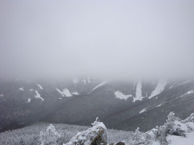 The clouds starting to rise as seen from West Bond summit - Click to enlarge