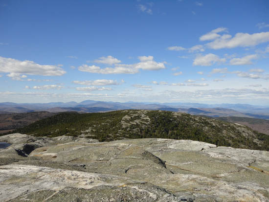 Looking north over the Firescrew at the White Mountains from Mt. Cardigan - Click to enlarge