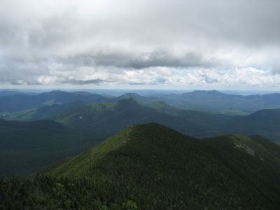 Looking at Signal Ridge, Mt. Tremont, and in the distance, the Moats and Chocorua, from the Mt. Carrigain summit tower - Click to enlarge