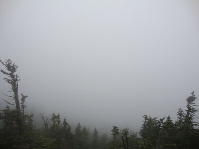 Looking at the fog from the Mt. Carrigain summit lookout tower - Click to enlarge