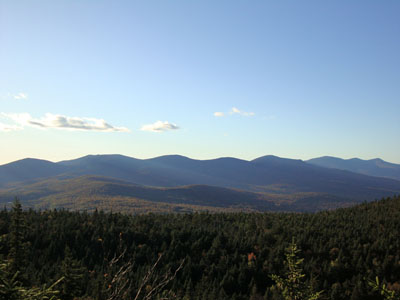 Looking at Pliny, the Waumbeks, the Weeks, Cabot, Bulge, and Horn from near the summit of Mt. Crescent - Click to enlarge