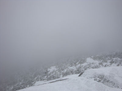 Looking into the clouds from the Mt. Garfield summit - Click to enlarge