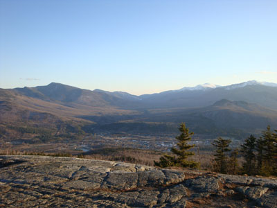 Looking at Pinkham Notch, surrounded by the Carters and Presidentials, from the southern ledges of Mt. Hayes - Click to enlarge