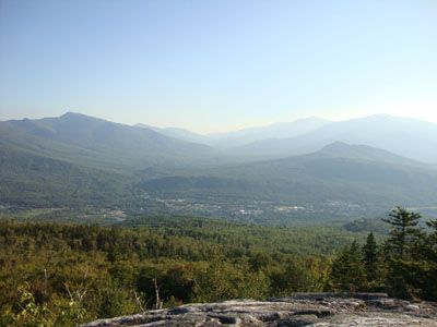 Looking at Pinkham Notch, surrounded by the Carters and Presidentials, from the southern ledges of Mt. Hayes - Click to enlarge