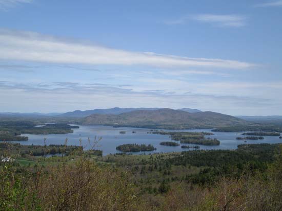 Looking at Squam Lake, Red Hill, and the Ossipee Range from Mt. Livermore - Click to enlarge