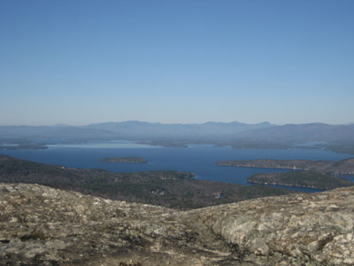 Looking over Lake Winnipesaukee at the White Mountains from the Mt. Major summit - Click to enlarge