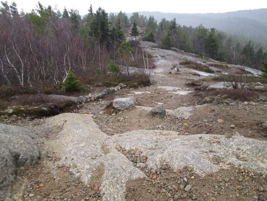 New cairns and scree wall leading hikers down the Brook Trail
