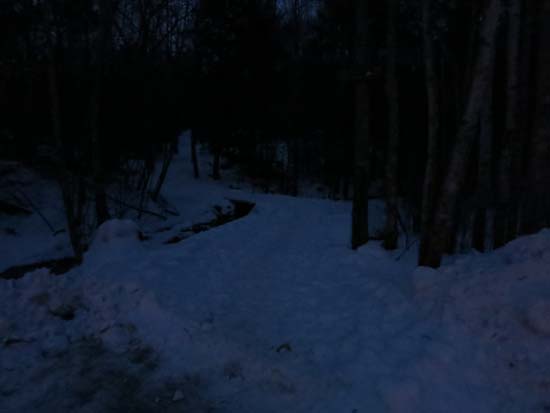 The Boulder Loop Trail trailhead at the back of the Route 11 parking lot