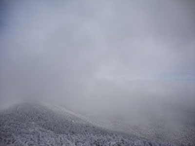 Brief views into the gorge from near the summit of Mt. Moosilauke's South peak - Click to enlarge