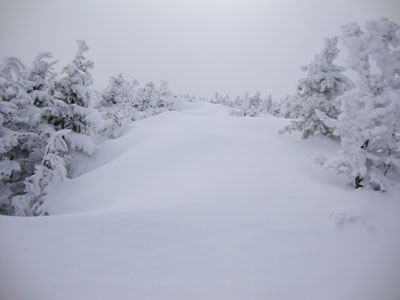 Looking up the drifted trail to the south peak