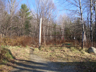 The Glencliff Trail trailhead at the edge of the parking area