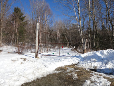 The Glencliff Trail trailhead at the edge of the parking area