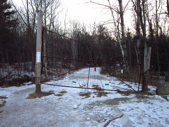The Glencliff Trail trailhead at the edge of the parking area